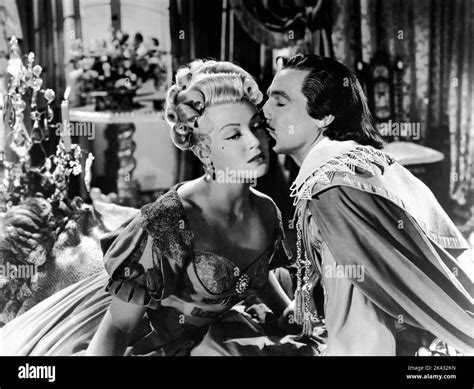 LANA TURNER as Lady de Winter and GENE KELLY as D'Artagnan in THE THREE ...