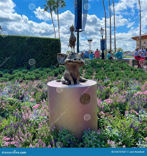 The 50th Anniversary Statue of Hei Hei and Pua at EPCOT in Walt Disney ...