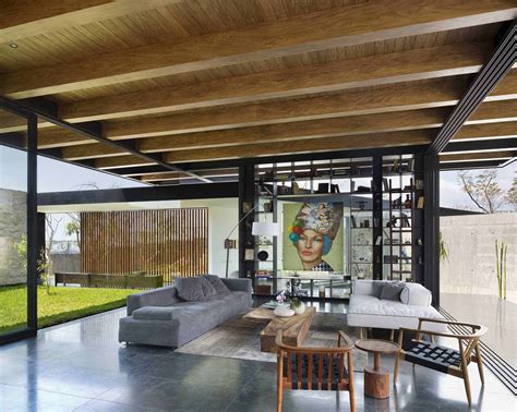 The Exposed Wood Ceiling Of This Home Shows Off Its Structure ...