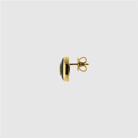 Gucci Interlocking 18k stud earrings in 18k yellow gold | GUCCI® US