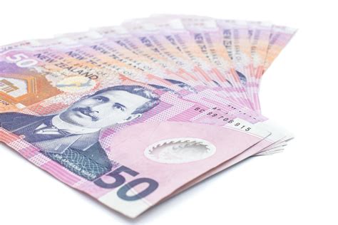 New Zealand 50 dollars bank note on isolated white background. The New Zealand Dollar is the ...
