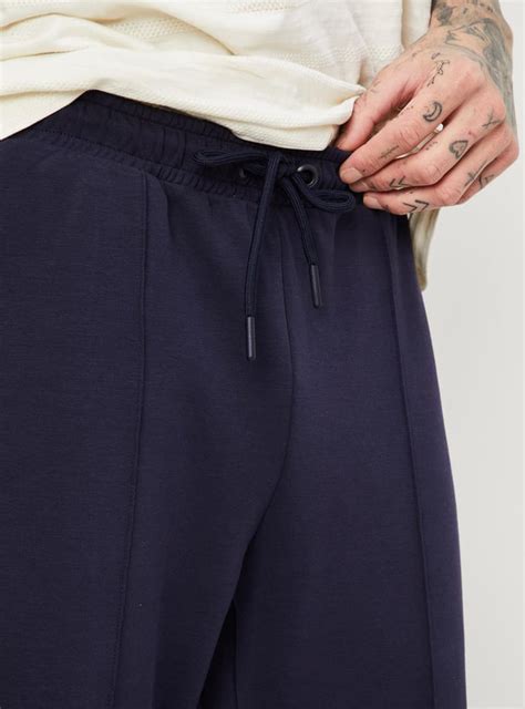 Buy Men Solid Active Track Pants Online at just Rs. 1199.0 ...