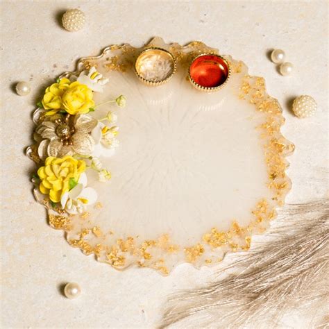 Buy Yellow Fleur Resin Roli Pooja Thali 6" Online in India - Mypoojabox.in