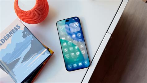 https://images.macrumors.com/article-new/2026/01/iPhone-18-Pro-with-a-smaller-centered-Dynamic-Island.jpg