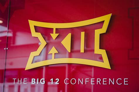 The big 12 conference logo is displayed on a glass wall photo – Free ...
