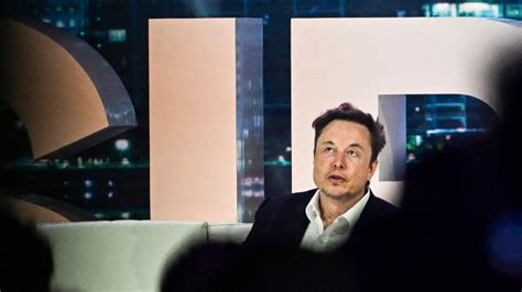 Elon Musk speaks during an interview with head of TED Chris Anderson (out of frame) at the TED2022: