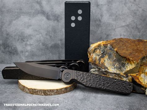 Tactile Knife Co. Exclusive Rockwall Thumbstud Black Jigged Titanium M ...