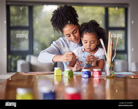 Learning, mother and child painting for an art preschool project with a ...