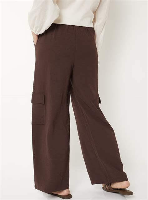 Buy Women Solid Loose Fit Cargo Trousers Online at just Rs. 1199.0 ...