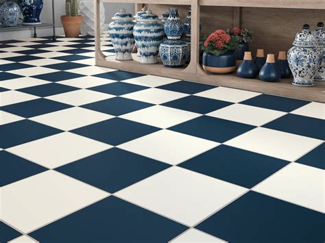 Checkerboard in blue and cream ceramic tile—love how it looks with the ...