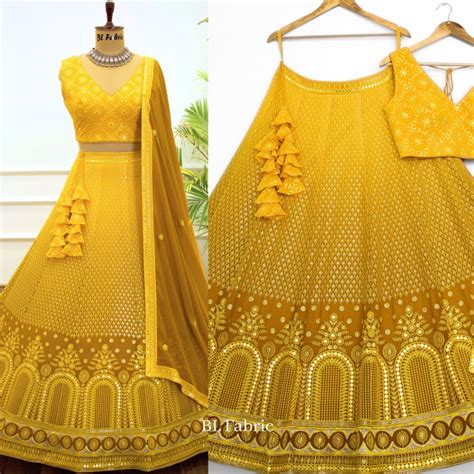 Shadding Yellow color Mirror & Sequence Embroidery work Designer Lehen ...