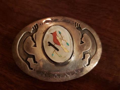 Lot 314: Navajo Richard Begay Inlay Red Bird Belt Buckle | EstateSales.org