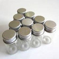 SVM Enterprises, Mumbai - Glass Bottle Caps and Glass Oil Bottle Supplier