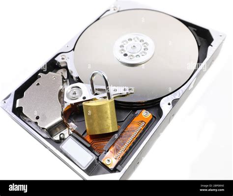 hard disk for archiving computer data and a padlock on a white ...