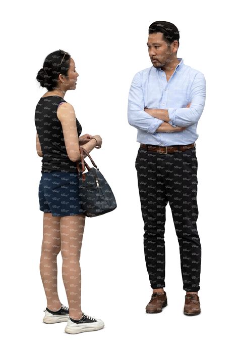two people standing and talking indoors - VIShopper