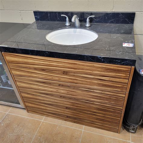 Approx. 40.5 x 24.5 x 34 H Tigerwood bathroom vanity c/w porcelain ...