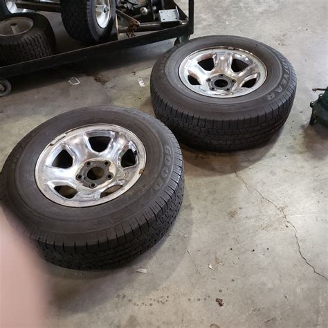 PAIR OF P 265 70 R17 TIRES ON 5 BOLT RIMS - Big Valley Auction