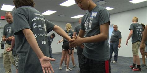 Teens get a day in the life of police officers at camp