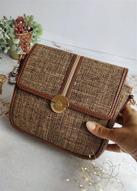 Get Brown Textured Basic Sling Bag at ₹ 1550 | LBB Shop