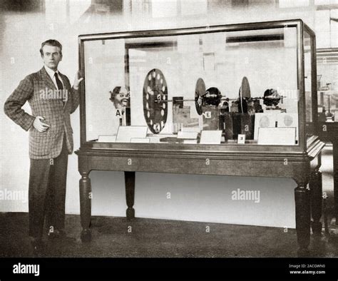 John Logie Baird (1888-1946), Scottish engineer and inventor, with his television of 1925-1926 ...