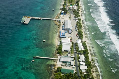 "We are sinking": Tuvalu minister gives climate speech knee-deep in the sea - The Weather Network