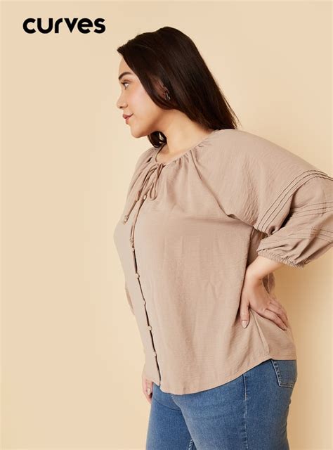 Buy Women Hammered Texture Tie-Up Neck Blouse Online at just Rs. 999.0 ...