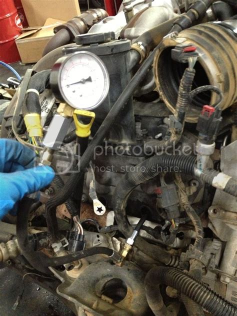 Image result for Compression Check On a 427 Chevy