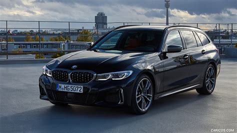 2020 BMW M340i xDrive Touring (Color: Black Sapphire Metallic) | Front Three-Quarter