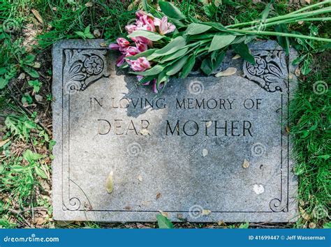 Flowers on Mothers Grave Marker Stock Image - Image of sadness ...