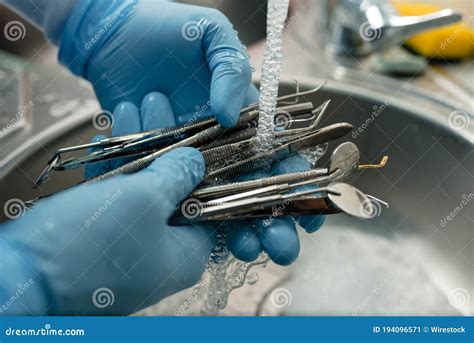 Top View Shot of Dentist Cleaning the Dental Instruments Stock Image - Image of instrument ...