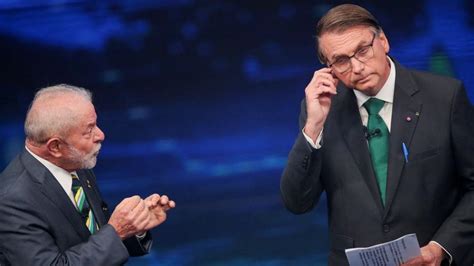 Brazil's Bolsonaro and Lula spar in first debate of runoff campaign ...