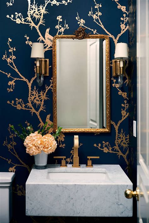 Glamarous blend of gold and dark blue in the contemporary powder room ...