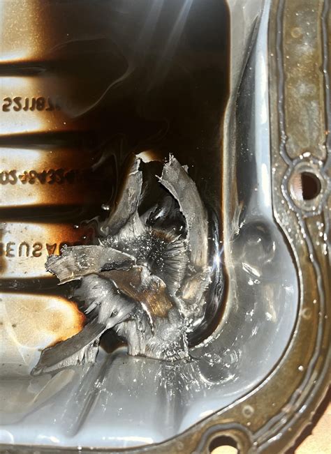 Metal strips in transmission pan : r/Transmission