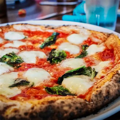 The History of Pizza in Italy: Origins & Evolutions