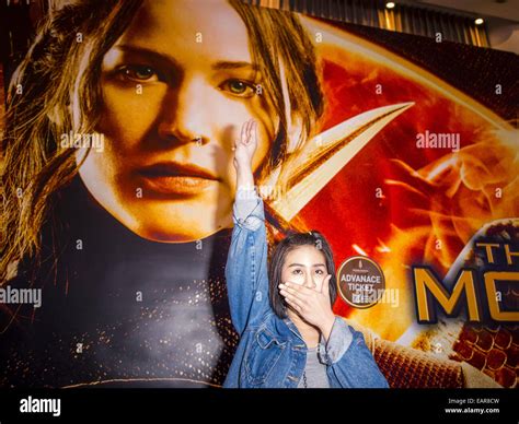 Three fingered salute hunger games hi-res stock photography and images ...