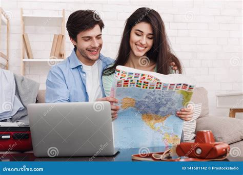 Happy Couple Planning Vacation Trip, Studying Map Stock Photo - Image ...