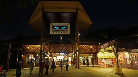 Families arriving at Mandai Wildlife Reserve Singapore at night for the Night Safari entrance