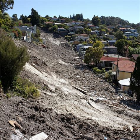 Landslide affecting a hillside community with earth movement | Premium ...