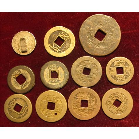 752. (10) Ancient Chinese Coins with square holes and a Silver Mexico ...
