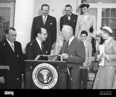 Dr. Jonas Salk (second from the left), University of Pittsburgh scientist who discovered the ...