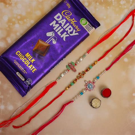 Send Pavitra Rakhi Set with Dairy Milk Chocolate Bar Online