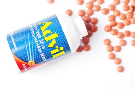 Washington, USA - October 02 2022 Bottles of advil and pills spread on ...