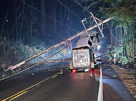 Pickup truck suspended in power lines on US 101 in Lilliwaup | The Olympian