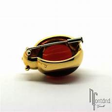 coccinella pomellato pomellato spilla quot coccinella quot in oro giallo e granato coccinella pomellato pomellato spilla quot coccinella quot in oro giallo e granato