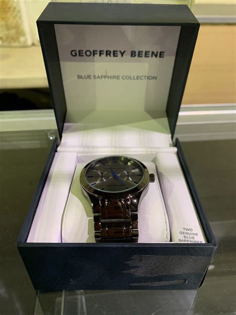 GEOFFREY BEENE BLUE SAPPHIRE COLLECTION WATCH - Able Auctions