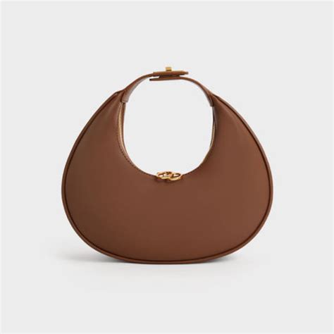 Half moon bags: The must-have accessory rocked by fashion's It Girls