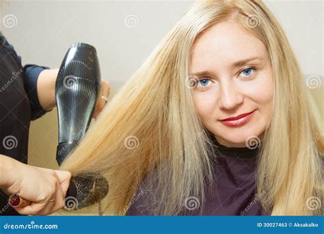 Hairdressers Hands Drying Long Blond Hair Stock Image - Image of adult ...