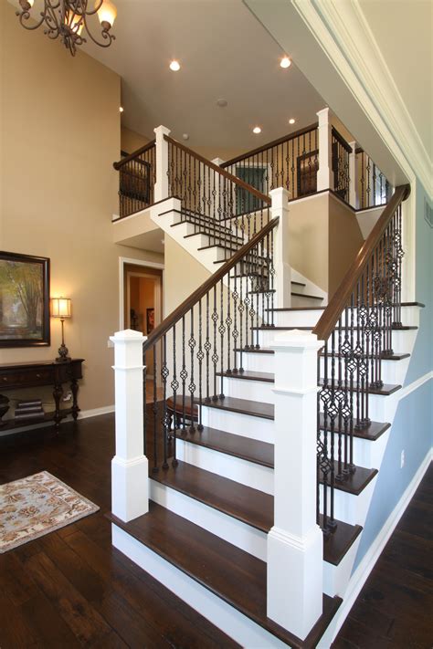 Open railing stairs with wrought iron balusters avbinc.com Modern Stair ...