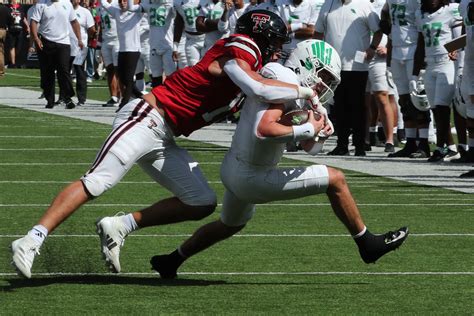 Walk along concourse of the Jones AT&T Stadium south end zone building