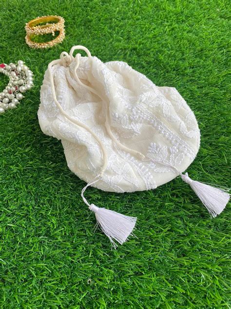 Ivory Chikankari Hand Embroidered Potli Bag – Dress365days